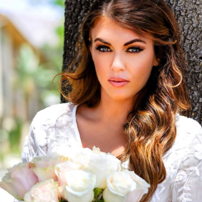 Bride against tree